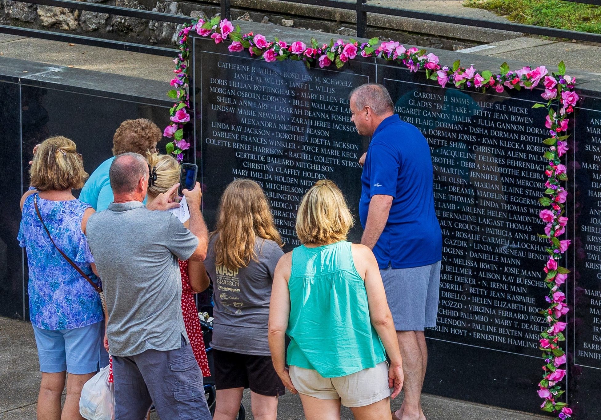 Wall People MothersDay 2023 Visitors paying tribute to their mother on the Mothers' Wall.